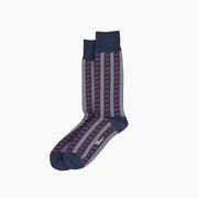 Navy, red and white shutters socks on grey background.