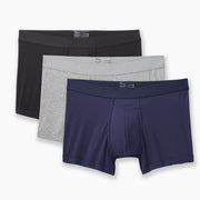 Boxer Brief Variety pack in black, heather grey and navy blue all laid on light grey background..