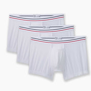 3 pairs of All American White boxer briefs on grey background.