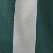 Close up detail shot of hunter green and cream stripe slim fit boxer.