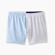 4 panel slim fit boxer with various colors like light blue, dark blue, and white laid flat on light grey background.