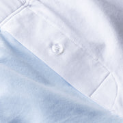 Close up detail shot of button found on Color Block Blue slim fit boxer.