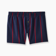 Mariner slim fit boxer featuring dark navy with think red striped laid flat on grey background.