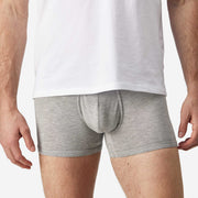 Close up front view of man wearing heather grey boxer brief.