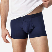 Front view of man wearing navy blue boxer brief.