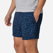 4" Midnight Leopard Pocket Lounge Short on model tight crop with grey background.