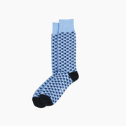Blue and grey gradient socks on grey background.
