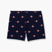 Pair of navy blue Cabin Club lounge shorts against light grey background