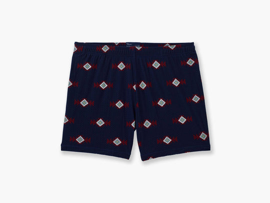 Pair of navy blue Cabin Club lounge shorts against light grey background