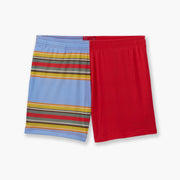 Pair of Canoe Stripe lounge shorts (red, blue, yellow, green, orange stripes) against a light grey background.