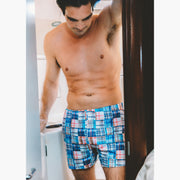 Shirtless man  in boat bathroom wearing Blue Madras Slim Fit Boxers