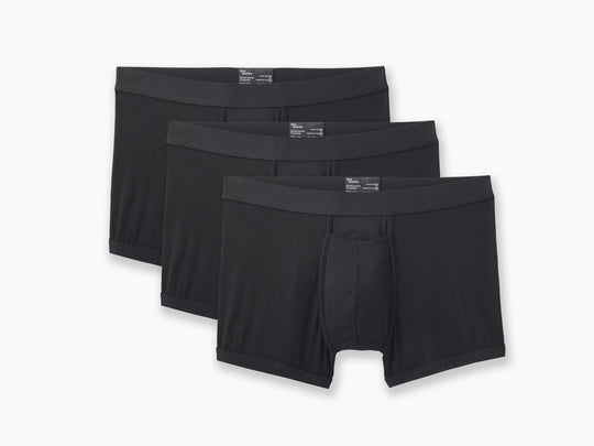 3 pairs of Black boxer briefs on grey background.