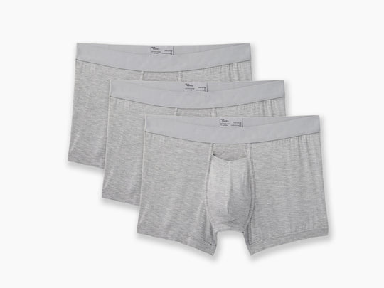 3 pairs of Heather Grey boxer briefs on grey background.