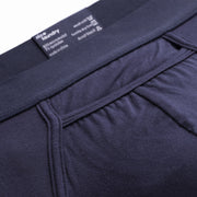 Close up detail shot of navy blue horizontal pouch found on brief.