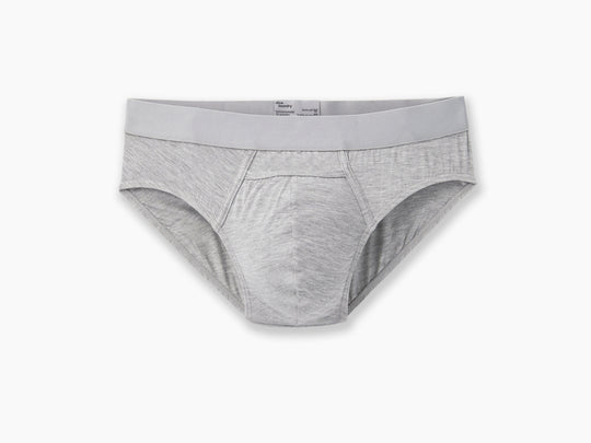Heather grey brief laid flat on grey background.