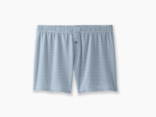A pair of tech varsity slim fit boxers in  green Captain Stripe sitting flat against light grey background.