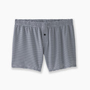 A pair of tech varsity slim fit boxers in  navy Captain Stripe sitting flat against light grey background.