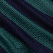 Close up detail shot of green/navy stripe lounge shorts