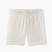 Cream 6 inch lounge short with drawstring laid flat on grey background.