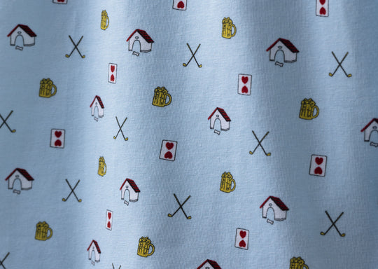 Close up detail shot of Light Blue Doghouse slim fit boxer (orange with small icons like dog house, golf clubs, card etc)