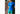 Man wearing a blue shirt and green Doghouse slim fit boxer (green  with small icons like dog house, golf clubs, card etc) standing in front of wooden wall
