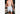 Shirtless man inside bathroom wearing white/purple pastel dasher lounge shorts