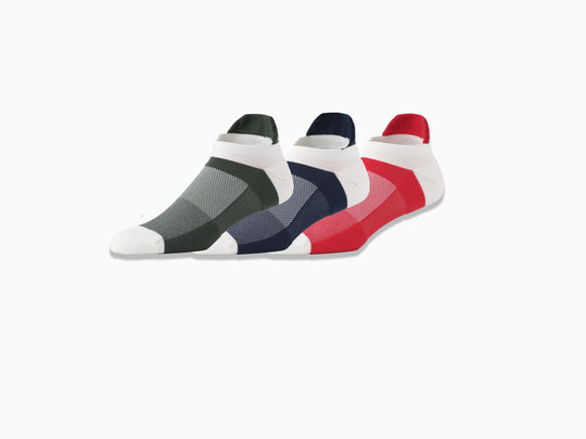 3 pairs of performance ankle socks on light grey background. One hunter/cream, one navy blue/cream, one red/cream. 