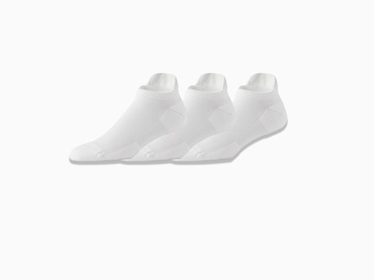 3 pairs of white performance ankle sock floating against a light grey background.