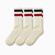 3 pairs of tech varsity crew socks in vintage white with navy blue and red stripes at the top.