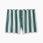 Hunter green and cream stripe colored slim fit boxers laid flat on light gray background.