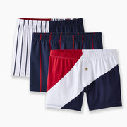 The Navies 3 pack of slim fit boxers laid flat on light grey background.