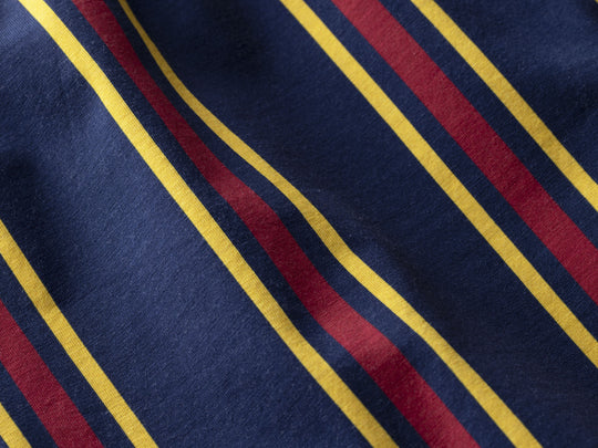 Close up detail shot of blue/red/yellow stripe slim fit boxers.