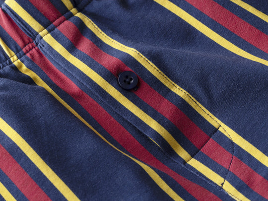 Close up detail shot of blue/red/yellow stripe slim fit boxers.