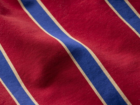 Close up detail shot of blue/yellow/red stripe slim fit boxer.
