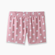 Pink slim fit boxers with white hand drawn dots sitting on a light grey background.
