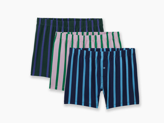 3 pairs of ivy stripe slim fit boxers against light grey background. One is navy, one is pink/green, and one is hunter/purple. 