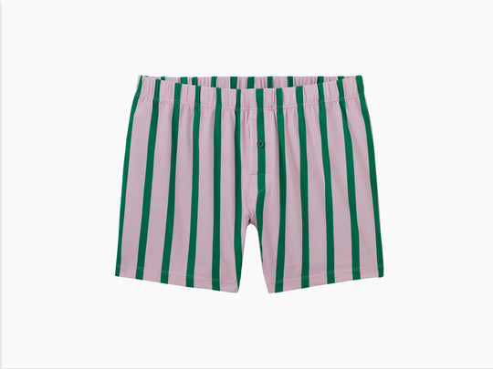 Pair of pink/green stripe slim fit boxer laid flat on light grey background.