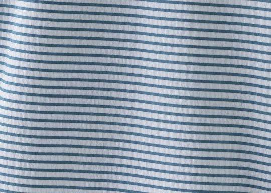 Close up detail shot of the texture on our tech varsity slim fit boxers with green stripes