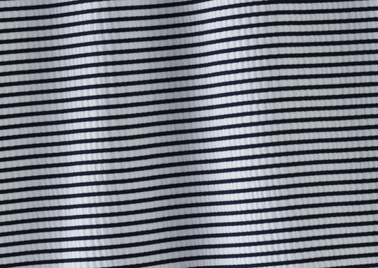 Close up detail shot of the texture on our tech varsity slim fit boxers with navy stripes