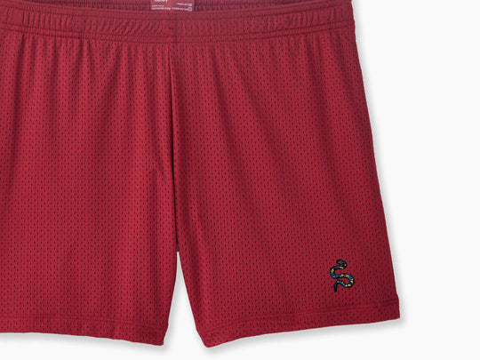 Burgundy pocket lounge short with serpent embroidery on bottom right of leg.