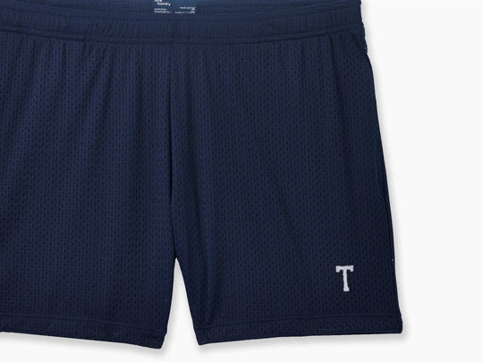 4" Pocket Lounge Shorts ~ Navy layflat with "T" monogram embroidery in bottom right corner.