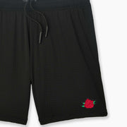 Black pocket lounge short with rose embroidery on bottom right of leg.