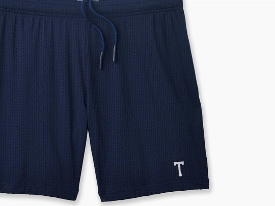 6" Pocket Lounge Shorts ~ Navy layflat with "T" monogram embroidery in bottom right corner.