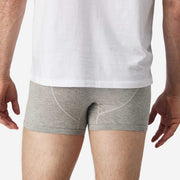 Close up back view of man wearing heather grey boxer brief.