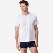 Front view of man wearing navy blue boxer brief.