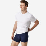 Side view of man wearing navy blue boxer brief.
