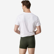 Back view of man wearing olive boxer brief.