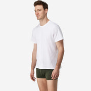 Side view of man wearing olive boxer brief.