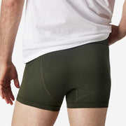 Close up back view of man wearing olive boxer brief.