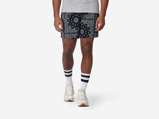 6" Bandana Pocket Lounge Shorts on model with grey t shirt and tech varsity socks.